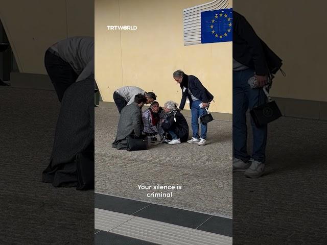 Woman breaks into tears during Gaza protest outside EU Commission