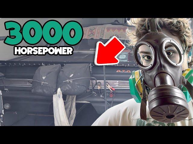 He needs a gas mask to start his 3000 horsepower drag car...