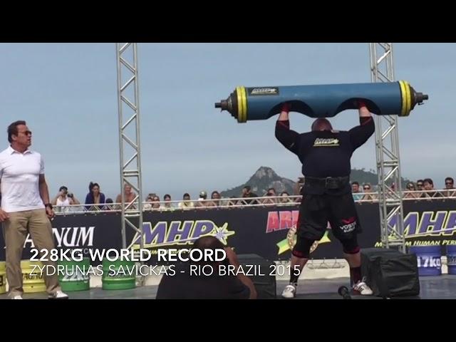 Big Z World log lift record 228kg in front of Arnold Schwarzenegger