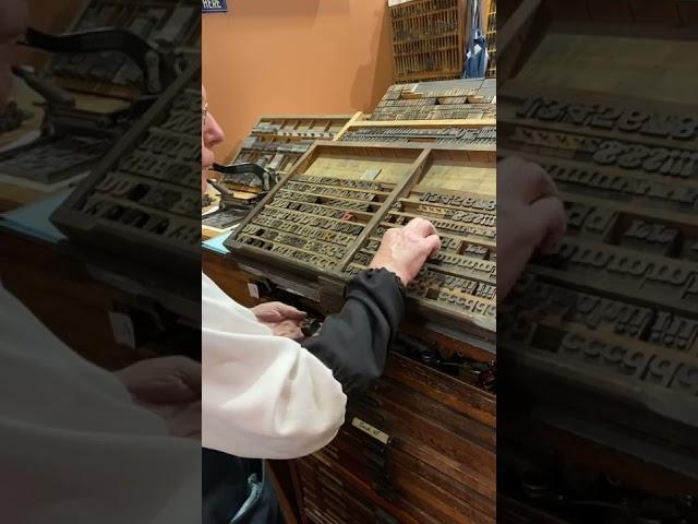 Cleaning up after filming our St. Patrick’s Day video in our print shop exhibit