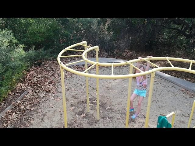 Dji. Spark Drone: Kids on the monkey bars at the playground