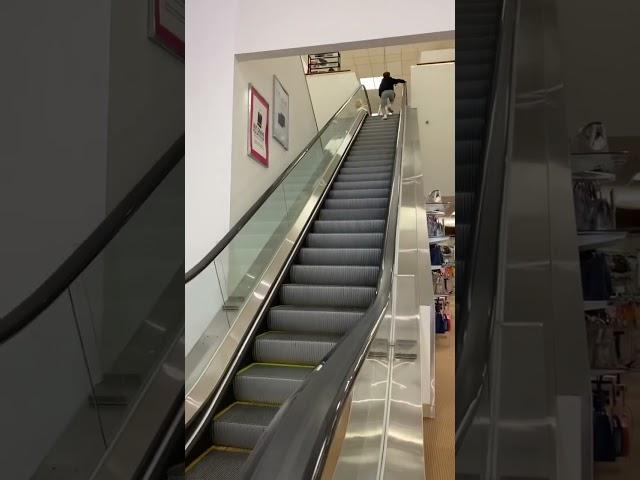 Kid runs up the wrong side of the escalator #shorts