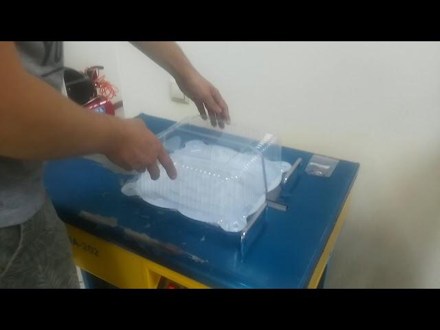 Упаковка тортов лентой на стреппинг машине