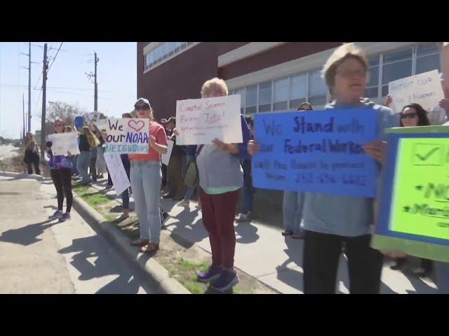 People protest against layoffs to NOAA and National Park Workers