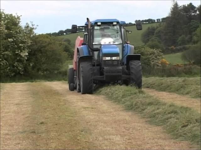 New Holland TM150 with Kuhn baler