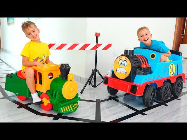 Vlad and Niki play with Toy Trains