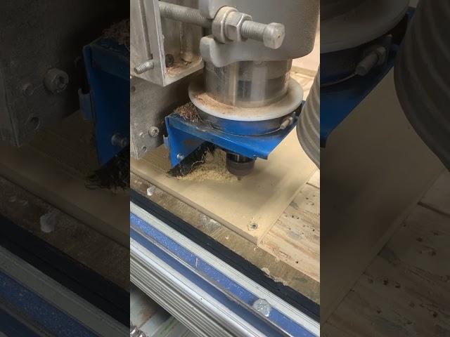 Big CNC cutting a template