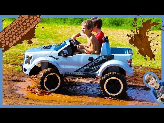 Unboxing Ride on Cars - Power Wheels Ford F150 Raptor Truck Rides in the Mud!