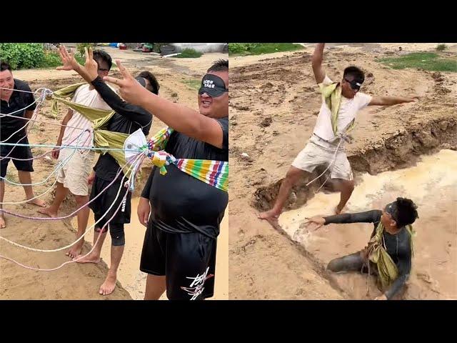 Cool off in the summer. Puddle rock-paper-scissors blindfold challenge for men's simple happines