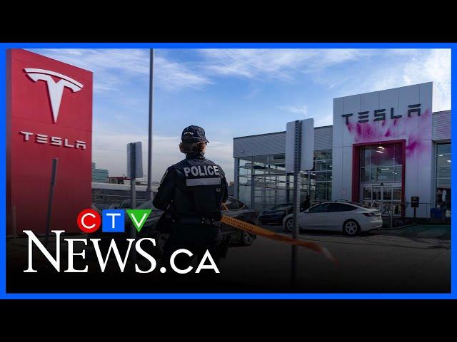 Tesla dealership painted by protesters