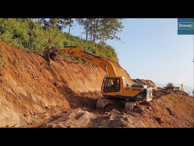 Final Touch for a Hilly Slope-Hyundai Excavator-Hilly Road Construction