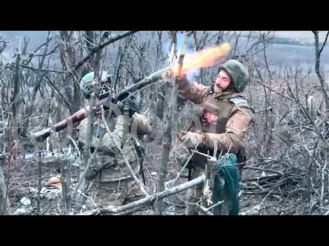 Russian sappers use a grenade launcher to mine the area with POM-2 mines