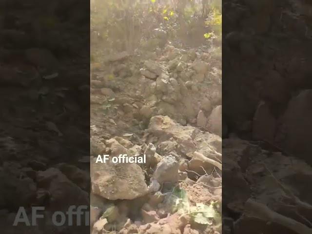 Ukrainian soldiers film the crater from the shell that almost got them!