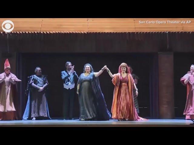 Ukrainian, Russian opera singers hug after performance