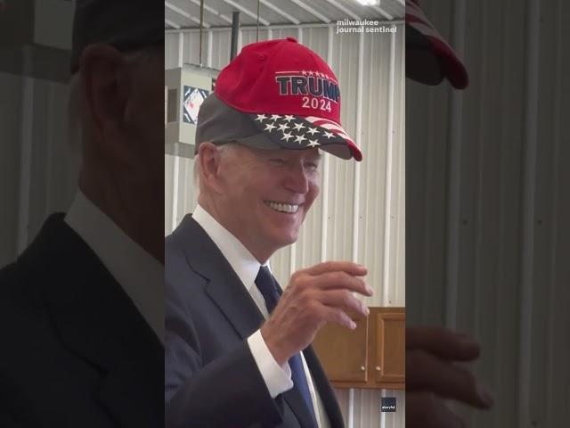 Joe Biden jokingly wears Trump hat in cap swap with MAGA supporter