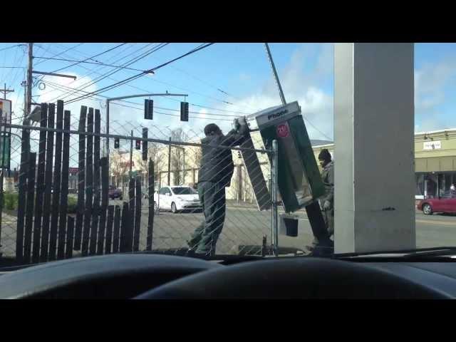 2 black guys steal a telephone booth