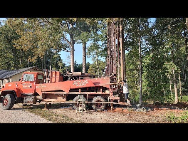 Finishing The Gutters Pipes On The Cabin And Drilling A Well!