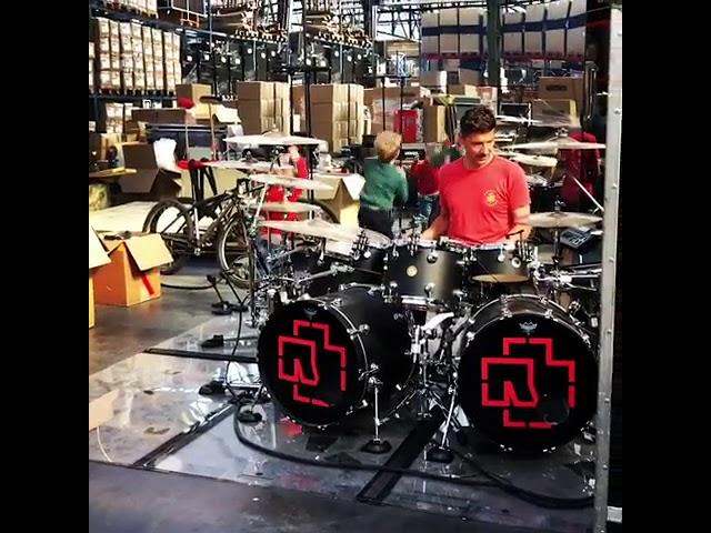 Rammstein drummer Christoph Schneider playing drums