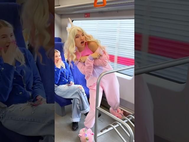 What makes her undress and dance in the subway? 
