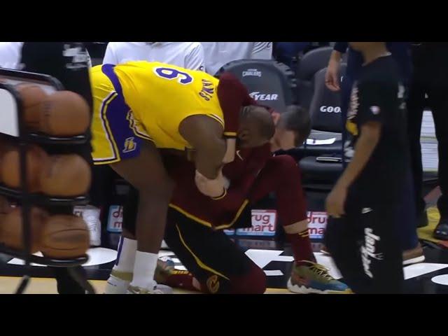 Kevin Love Headlocks LeBron After He Dunks on Him 