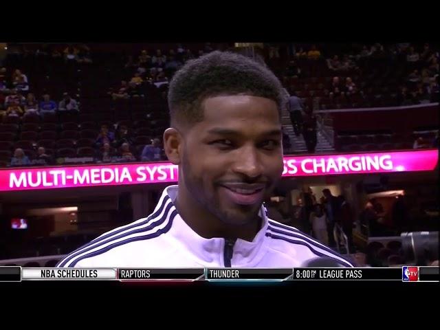 Tristan Thompson kisses a sideline interviewer on TV