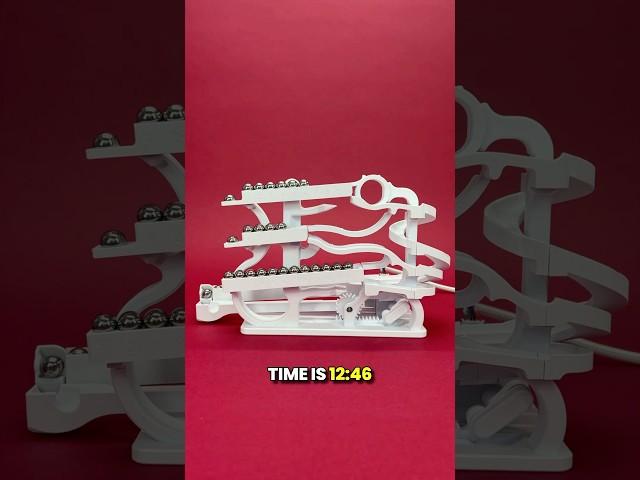 The Tipping Marble Clock