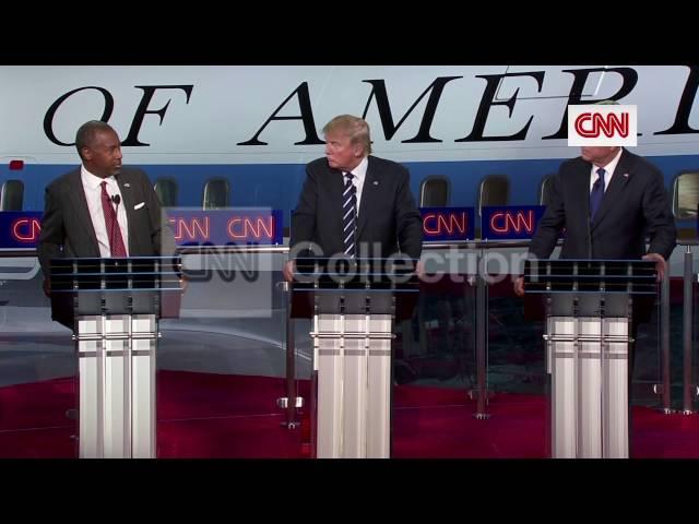 GOP DEBATE:TRUMP HIGH-FIVES CARSON FOR IRAQ WAR IDEA