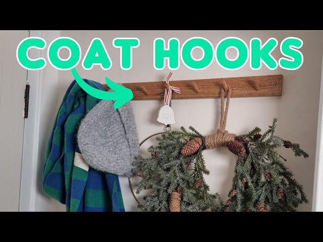 How to fit coat hooks to a solid wall