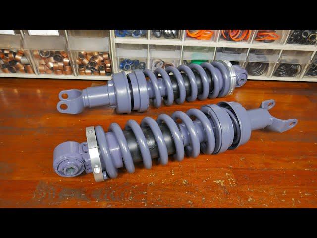 Тойота Мега Крузер ремонт задних амортизаторов.Toyota Mega Cruiser rear shock absorber repair.