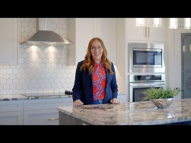 Dione Irwin Tours this gorgeous fully developed bungalow, with walkout, backing on to a greenspace