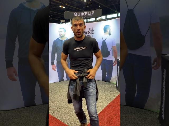 Rener Gracie, founder of QuickFlip Apparel, demos hoodies to ZOOMcatalog at ASI Chicago