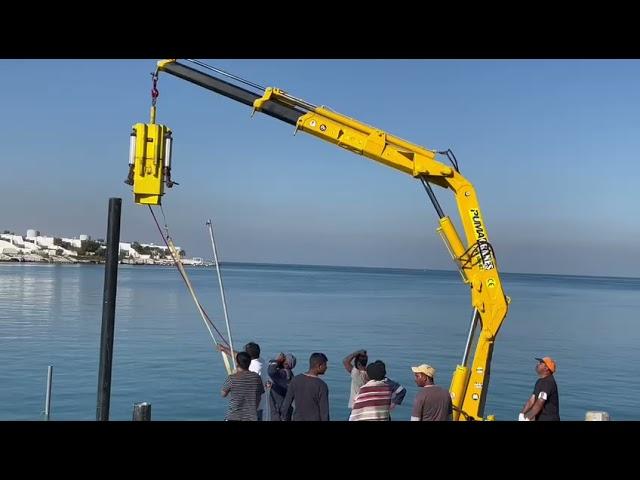 Puma work boat hydraulic crane,pipe hammering machine