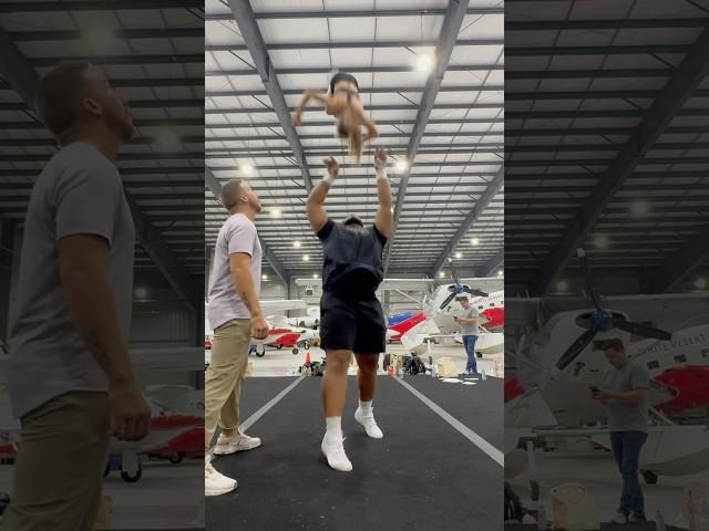 Yes, those are airplanes in the back! #cheer #cheerleading #stuntvideo #stunt #cheerstunts