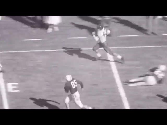 Alabama's Tommy Lewis tackles Rice's Dicky Maegle in the 1954 Cotton Bowl