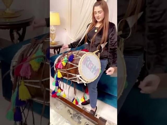 Arishma playing Dhol