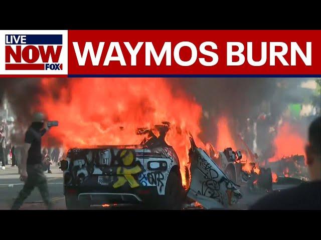 Cars go up in flames as anti-ICE protests, clashes with authorities continue in downtown Los Angeles