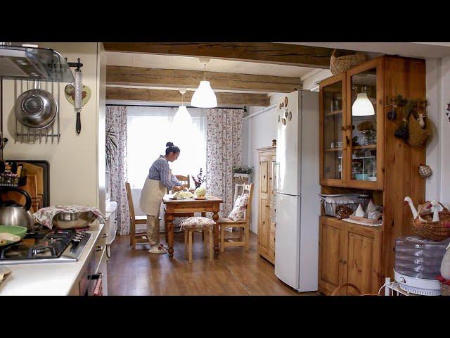 One day in the village. Preparing for winter: picking rose hips, pickling cabbage, sewing an apron