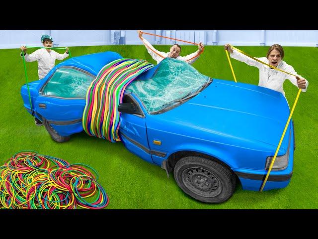 WE CRUSHED A CAR WITH 3-FOOT RUBBER BANDS!