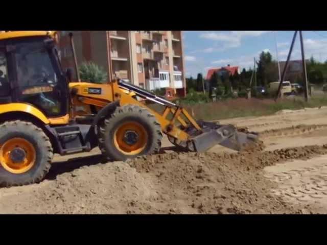 Выравнивание площадки под автостоянку трактором JCB - steh39.ru