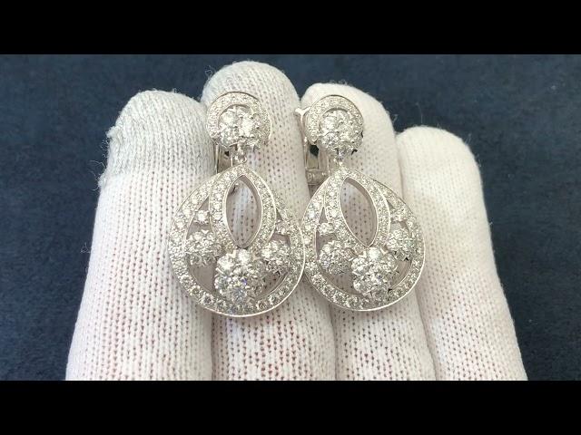 Platinum, Diamond Snowflake earrings, large model#fashiontrends #platinum #snowflakes #modeling