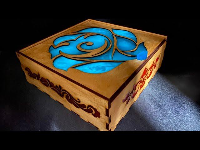 DIY glowing box made of wood and epoxy resin.