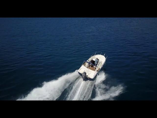 Aerial Video Active Tracking Speed Boat Video 1 in front of Corfu Town