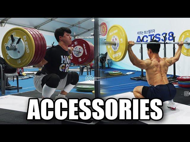 Korean weightlifters working on their accessories