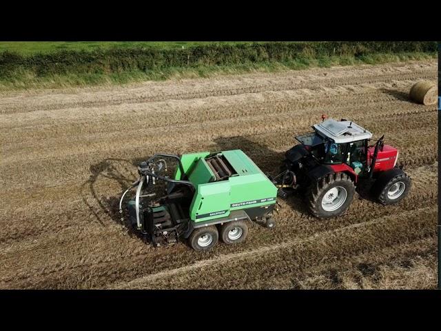 Massey Ferguson 8130 pulling a Deutz-Fahr MP 135 Balepack