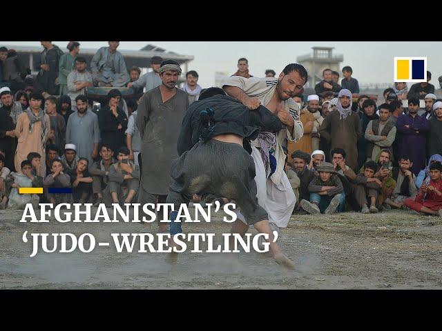 Afghan fighters throw down in ‘judo-wrestling’ matches in dusty Kabul field