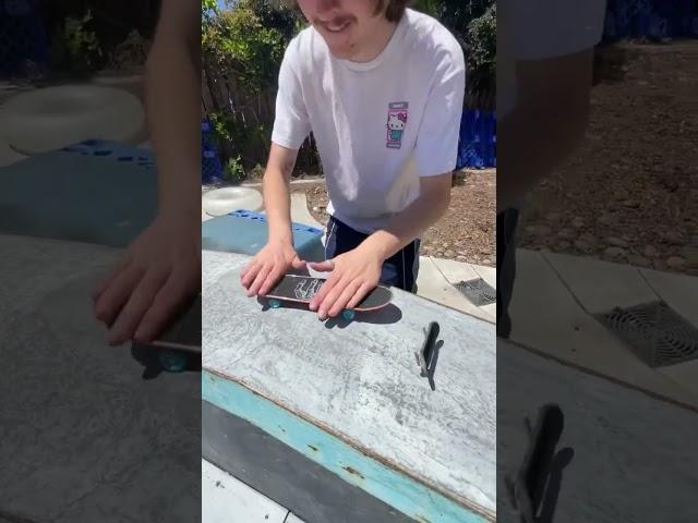 Kickflip on a fingerboard, handboard and skateboard!  #shorts