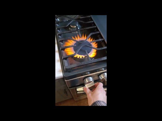 Why is my gas burner flame orange and yellow?