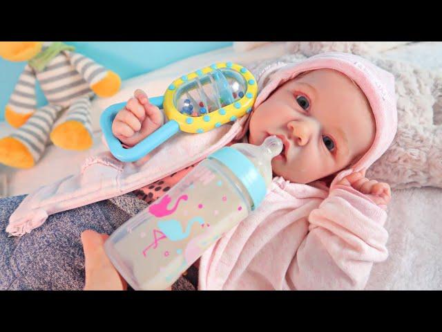 Reborn baby doll feeding and changing clothes and diapers Zyriki TV