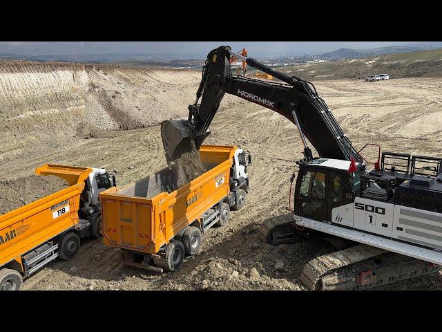 Hidromek Excavator Trucks Loading