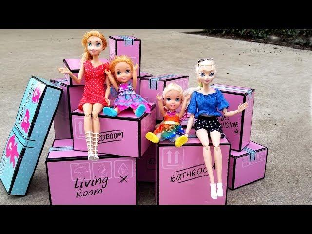 Playhouse surprise ! Elsa and Anna toddlers - moving truck - unpacking - LOL